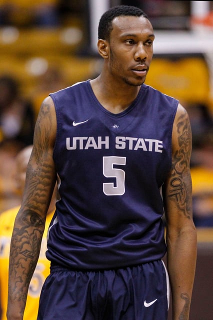 This file photo from Feb. 1, 2014 shows Utah State center Jarred Shaw (5) during a game against Wyoming at Arena-Auditorium in Laramie, Wyoming.