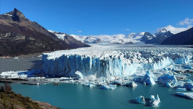 Ice calves off from the Perito Moreno glacier into the Lago Argentino (Argentine Lake), in the Parque Nacional Los Glaciares, near the city of El Calafate in the Patagonian province of Santa Cruz, Argentina on April 21, in this screengrab from a video. 
