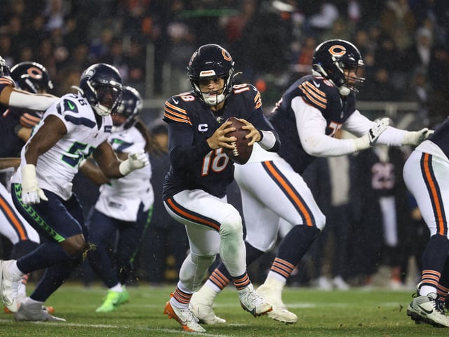 Dec 26, 2024; Chicago, Illinois, USA; Chicago Bears quarterback Caleb Williams (18) rolls out of the pocket during the third quarter against the Seattle Seahawks at Soldier Field. Mandatory Credit: Talia Sprague-Imagn Images/File Photo