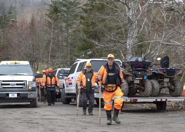 Searchers return to the basecamp after looking for Lily Sullivan and Jack Sullivan, two children missing since last week, in Lansdowne Station, Nova Scotia, Wednesday, May 7, 2025.