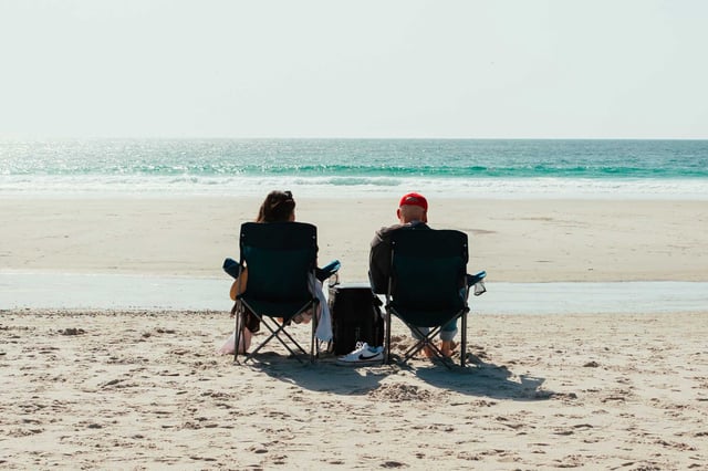 A couple relaxes on Carmel Beach. A new study published in the Journal of the American Heart Association finds that men are more than twice as likely as women to die from takotsubo cardiomyopathy, also known as broken heart syndrome. 