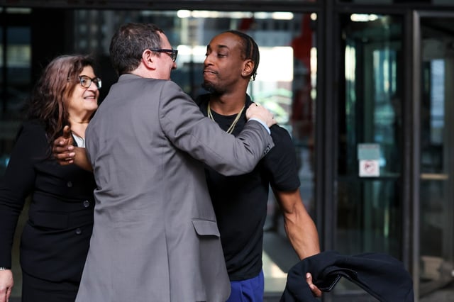 Anthony Mitchell, right, celebrates with attorneys Andrea Lyon, left, and Russell Ainsworth at a press conference outside of Dirksen U.S. Courthouse on March 10, 2025, after a federal jury awarded over $120 million in damages to him and John Fulton in their civil trial for wrongful conviction. (Eileen T. Meslar/Chicago Tribune)