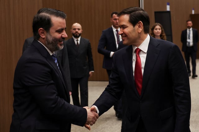 Syrian Foreign Minister Asaad Hassan al-Shibani shakes hands with U.S. Secretary of State Marco Rubio, at NEST International Convention Center, in Antalya, Turkey May 15, 2025. REUTERS/Umit Bektas/Pool