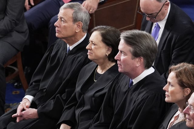 From left, Supreme Court Chief Justice John Roberts, Associate Justices Elena Kagan, Brett Kavanaugh and Amy Coney Barrett, listen as President Donald Trump addresses a joint session of Congress at the Capitol in Washington, Tuesday, March 4, 2025.
