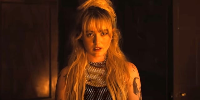 Kathryn Newton as Sammy looking at a person off screen in Abigail