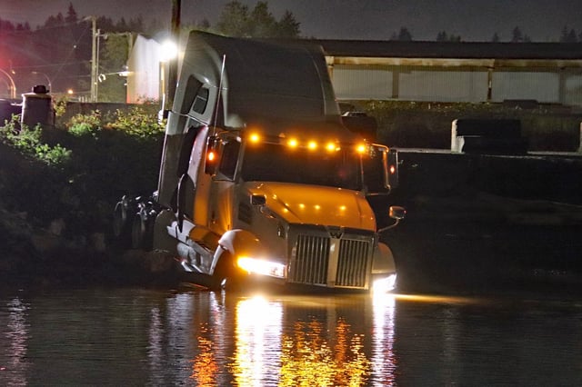 The stolen semi-truck ended up in the Fraser River in Langley following a police pursuit.