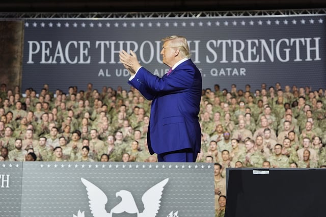 President Donald Trump applauds on stage at the Al Udeid Air Base, Thursday, May 15, 2025, in Doha, Qatar. (AP Photo/Alex Brandon)