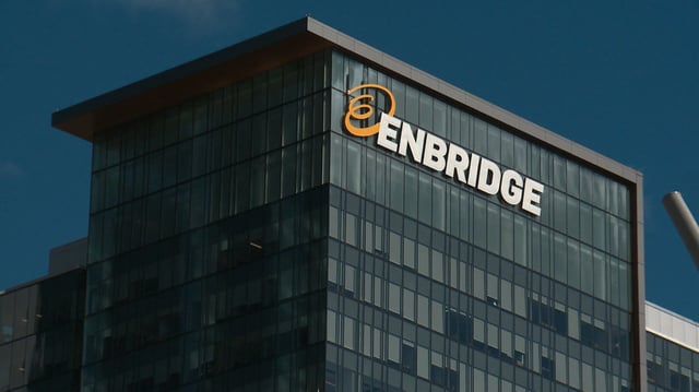 The Enbridge logo on the company's office building in downtown Edmonton.  The Calgary-based company has signed a deal to sell a minority stake in its Westcoast natural gas pipeline system to a consortium of 36 B.C. First Nations.
