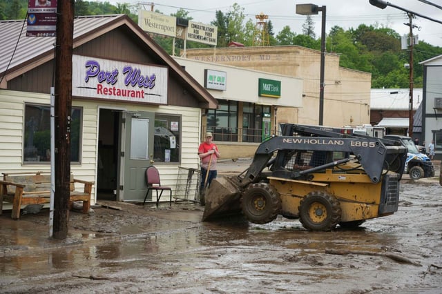 Clean up continues after flooding on Wednesday, May 14, 2025 in Westernport, Md. (AP Photo/Gene J. Puskar)