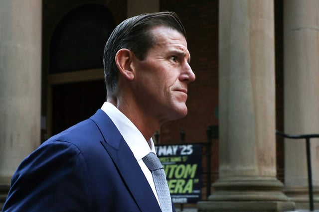 Former member of Australia's elite Special Air Service regiment Ben Roberts-Smith leaves the Federal Court in Sydney on May 1, 2025. Ben Roberts-Smith was back in court on May 1 to push to reopen his appeal against the judgment in the defamation case that implicated him in a string of war crimes in Afghanistan.