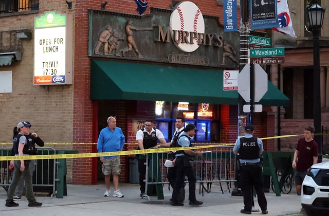 Chicago police tape off Murphy’s Bleachers sports bar at Sheffield and Waveland avenues after a shooting in the area, May 15, 2025. (Terrence Antonio James/Chicago Tribune)