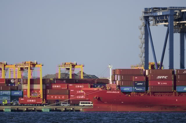 FILE - A container ship is docked at a cargo terminal in Tokyo, on April 9, 2025. (AP Photo/Hiro Komae)