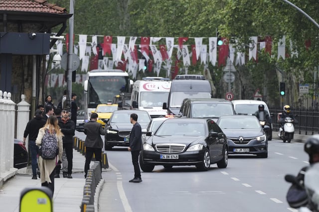Vehicles begin arriving outside a gate prior to expected talks between Russian and Ukrainian delegations at the Dolmabache palace, in Istanbul, Turkey, Friday, May 16, 2025. (AP Photo/Dilara Acikgoz)