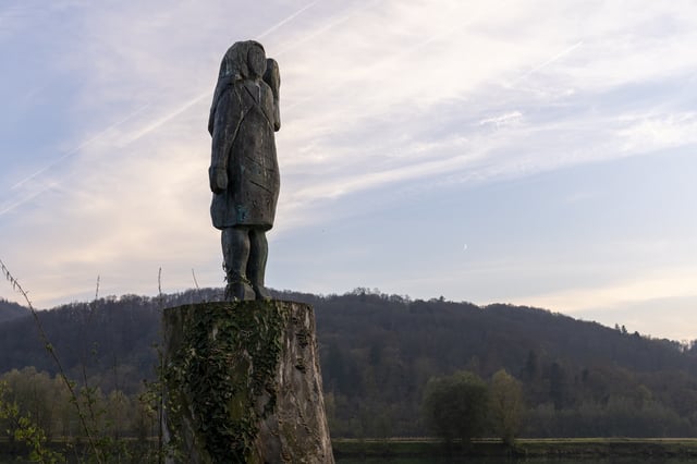 FILE -A bronze sculpture representing Melania Trump stands on a bank of the Sava river in the village of Rozno, near her hometown of Sevnica, Slovenia, Nov. 6, 2024. (AP Photo/Darko Bandic, File)