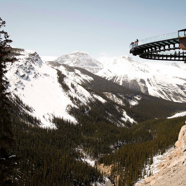 Tourists take in the views from the newly opened Glacier SkyWalk near the Columbia Icefields in Jasper National Park, Alta., Wednesday, May 7, 2014.THE CANADIAN PRESS/Jeff McIntosh