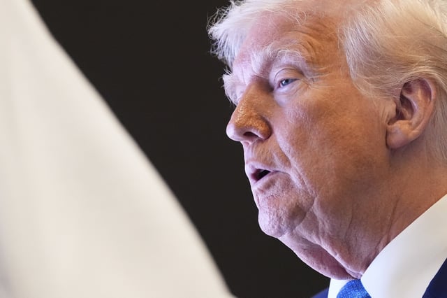 President Donald Trump attends a business meeting at Qasr Al Watan, Friday, May 16, 2025, in Abu Dhabi, United Arab Emirates.