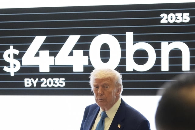 President Donald Trump next to an informative panel during a visit at Qasr Al Watan, Friday, May 16, 2025, in Abu Dhabi, United Arab Emirates.