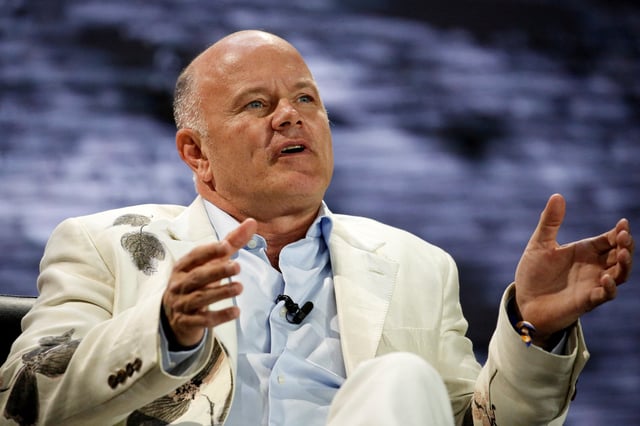 Mike Novogratz, founder and chief executive officer of Galaxy Digital, gestures as he speaks during the Bitcoin Conference 2022 in Miami Beach, Florida, U.S. April 6, 2022. REUTERS/Marco Bello/File Photo