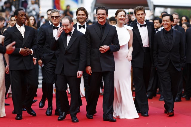 Director Ari Aster and cast members Emma Stone, Pedro Pascal, Joaquin Phoenix, Austin Butler, Micheal Ward, and Luke Grimes walk on the red carpet during arrivals for the screening of the film "Eddington" in competition at the 78th Cannes Film Festival in Cannes, France, May 16, 2025. REUTERS/Manon Cruz