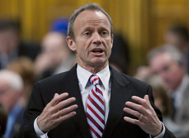 Stockwell Day rises during question period in the House of Commons on Parliament Hill in Ottawa on December 14, 2010. The former Canadian Alliance leader and Conservative MP says he thinks Alberta should hold a referendum on whether to separate from Canada. THE CANADIAN PRESS/Adrian Wyld