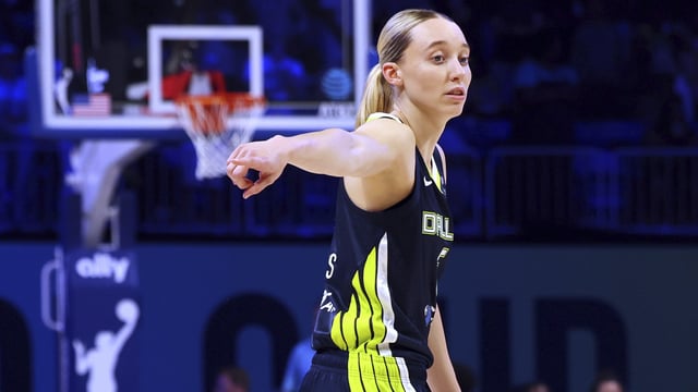 Dallas Wings guard Paige Bueckers gestures as she competes against the Minnesota Lynx in the first half of a WNBA basketball game, Friday, May 16, 2025, in Arlington, Texas. (AP Photo/Richard Rodriguez)