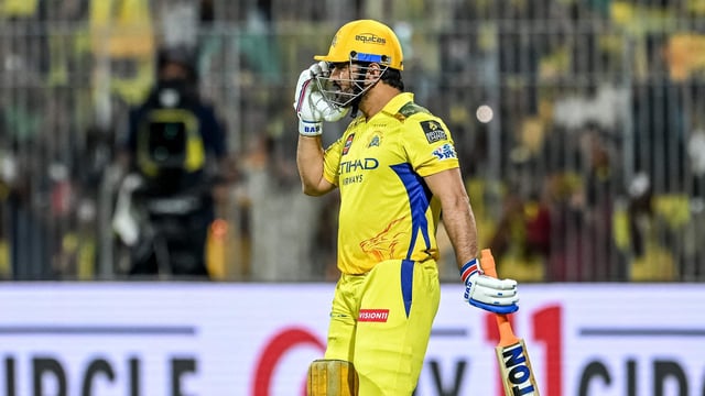 Chennai Super Kings' captain MS Dhoni arrives to bat during the Indian Premier League (IPL) Twenty20 cricket match between Chennai Super Kings and Punjab Kings at the MA Chidambaram Stadium