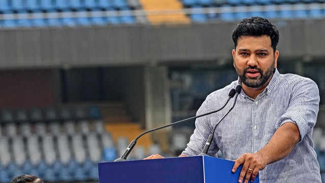 Rohit Sharma, the former captain of India, speaks during an event to unveil a cricket stand after his name at the Wankhede Stadium in Mumbai.