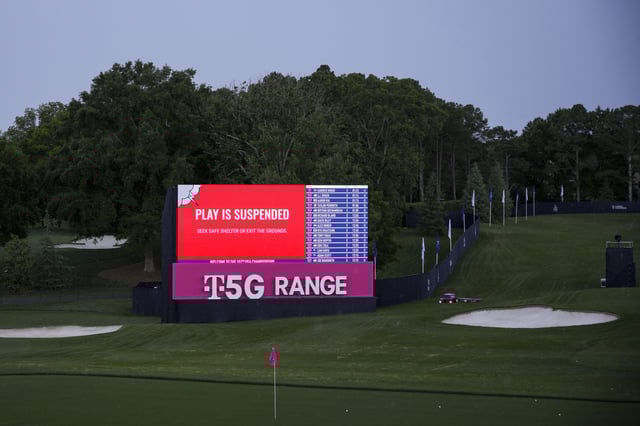 May 17, 2025; Charlotte, North Carolina, USA; A general view of a video board indicating play is suspended due to weather before the third round of the PGA Championship golf tournament at Quail Hollow. Mandatory Credit: Aaron Doster-Imagn Images