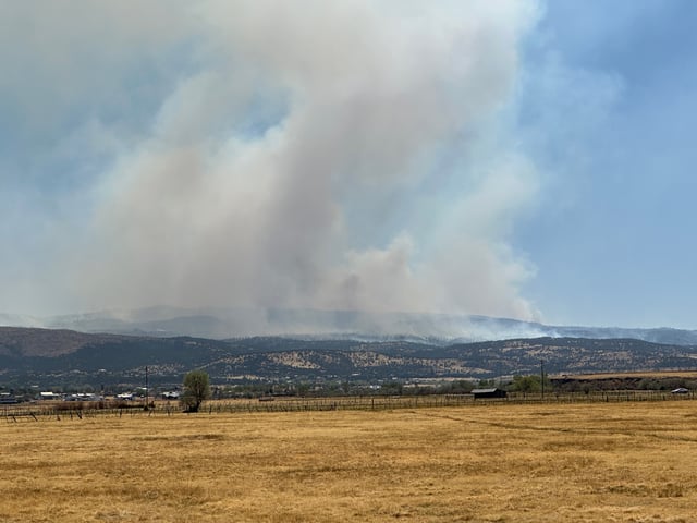 The Greer Fire burns in eastern Arizona on May 15, 2025, in this image taken from Eagar looking southwest toward the Greer Fire.