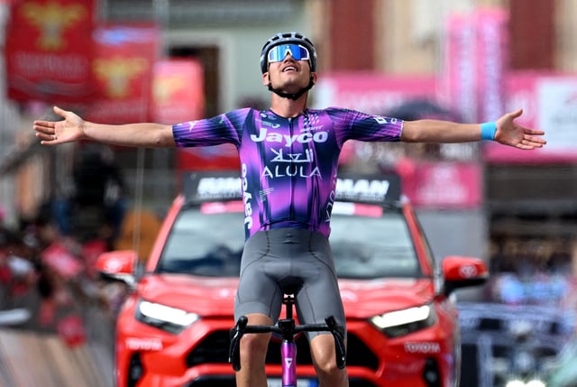 Cycling - Giro d'Italia - Stage 8 - Giulianova to Castelraimondo - Italy - May 17, 2025  Team Jayco AlUla's Luke Plapp celebrates as he crosses the finish line to win stage 8 REUTERS/Jennifer Lorenzini