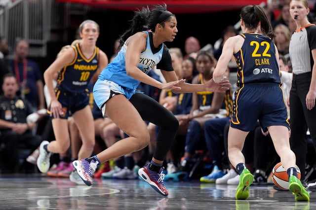 Angel Reese #5 of the Chicago Sky defends Caitlin Clark #22 of the Indiana Fever during the second half at Gainbridge Fieldhouse on June 16, 2024 in Indianapolis, Indiana.