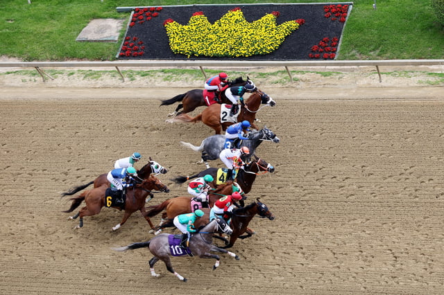 Jockeys ride horses during a race on Black-Eyed Susan Day prior to the 150th Preakness Stakes at Pimlico Race Course on May 16, 2025 in Baltimore, Maryland. Home of the Preakness horse race, Pimlico Race Course will be demolished in June 2025 ahead of a $400 million reconstruction.