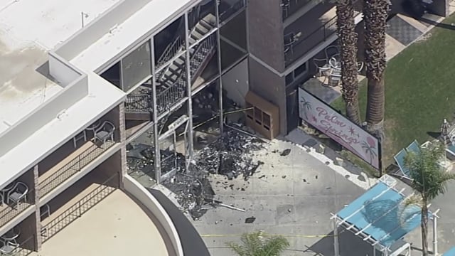 Debris covers the ground near the site of an explosion on Saturday, May 17, 2025 in Palm Springs, Calif. 