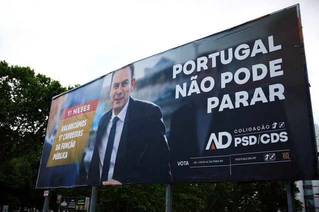 A view shows a billboard of the AD - Coalition PSD/CDS, ahead of Portugal snap elections in Lisbon, Portugal, May 5, 2025. REUTERS/Pedro Nunes/File Photo