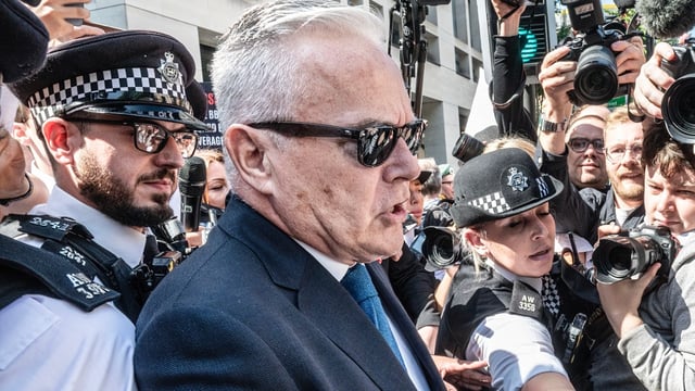 Huw Edwards leaves Westminster magistrates’ court after pleading guilty in July 2024