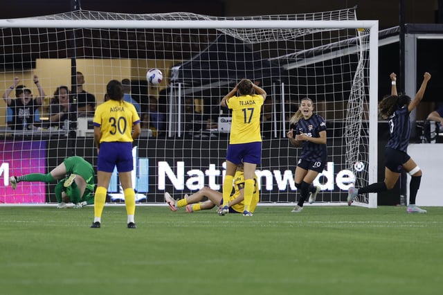 May 17, 2025; Washington, District of Columbia, USA; Washington Spirit defender Casey Krueger (3) celebrates after scoring a goal on Utah Royals FC goalkeeper Mandy McGlynn (1) in stoppage time during the second half at Audi Field. Geoff Burke-Imagn Images
