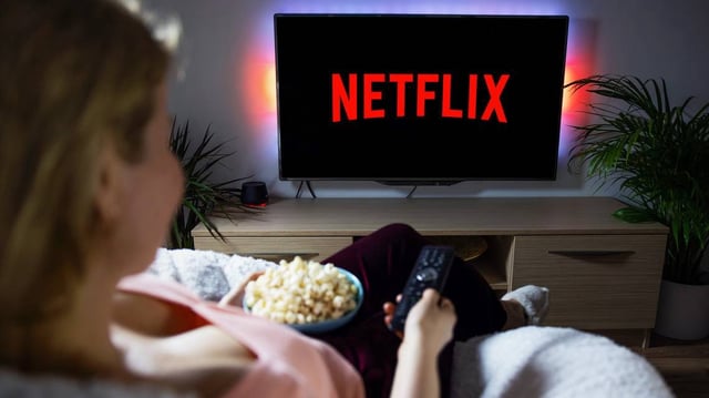 a-woman-is-seen-watching-netflix-lead.