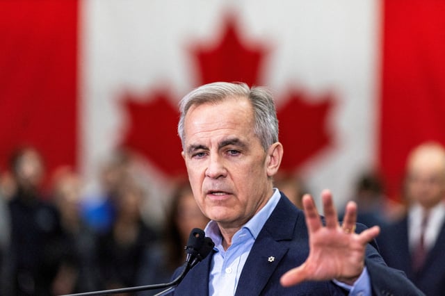 Canada's Prime Minister Mark Carney delivers remarks at Marmen Inc., a steel fabrication and machining company, during his Liberal Party election campaign tour in Trois-Rivieres, Quebec Canada April 22, 2025. REUTERS/Carlos Osorio/File Photo