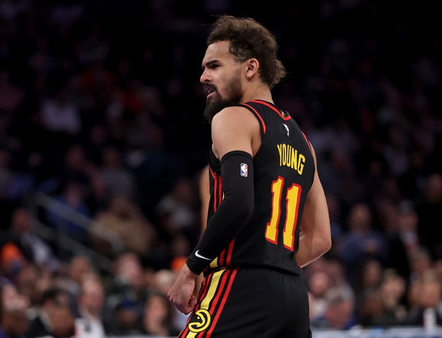 Trae Young #11 of the Atlanta Hawks reacts in the second half against the New York Knicks at Madison Square Garden on February 12, 2025 in New York City. The New York Knicks defeated the Atlanta Hawks 149-148 in overtime.