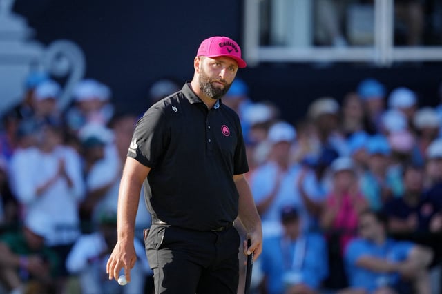 May 18, 2025; Charlotte, North Carolina, USA; Jon Rahm looks on from the 18th green during the final round of the PGA Championship golf tournament at Quail Hollow. Mandatory Credit: Aaron Doster-Imagn Images