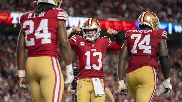 October 8, 2023; Santa Clara, California, USA; San Francisco 49ers quarterback Brock Purdy (13) celebrates with running back Jordan Mason (24) after a touchdown against the Dallas Cowboys during the fourth quarter at Levi's Stadium. Mandatory Credit: Kyle Terada-Imagn Images