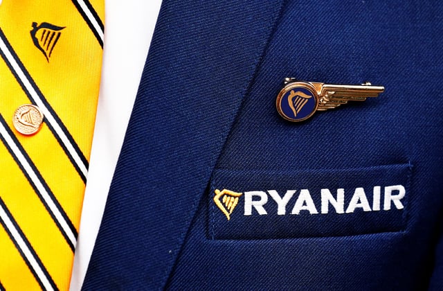 Ryanair logo is pictured on the the jacket of a cabin crew member ahead of a news conference by Ryanair union representatives in Brussels, Belgium September 13, 2018.   REUTERS/Francois Lenoir/File Photo