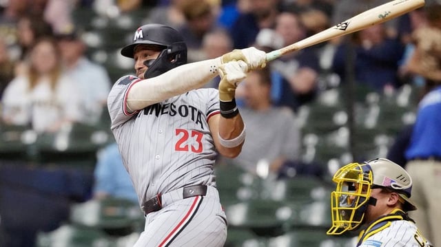 May 16, 2025; Milwaukee, Wisconsin, USA;  Minnesota Twins third baseman Royce Lewis (23) singles during the fourth inning against the Milwaukee Brewers at American Family Field. Mandatory Credit: Jeff Hanisch-Imagn Images