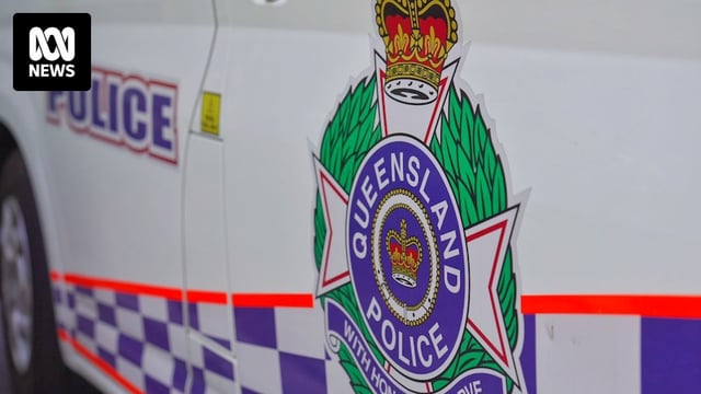 A logo on a vehicle reads "Queensland police".