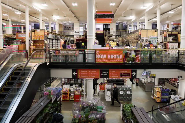 People shop at a Home Depot store in Manhattan in New York City, U.S.,  February 25, 2025. REUTERS/Jeenah Moon/File Photo