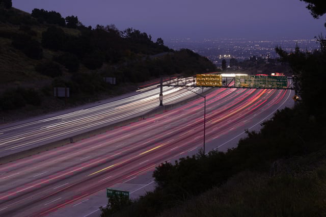 FILE - Traffic slowly moves along Interstate 405 Thursday, May 23, 2024, in the Bel Air section of Los Angeles ahead of Memorial Day. (AP Photo/Mark J. Terrill, File)