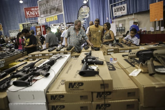 Thousands of people attend a Fort Lauderdale gun show in 2016. The House Criminal Justice Subcommittee, a subcommittee of the Florida Legislature, voted 12-5 on Monday in favor of legislation that would make the minimum age of a person buying a rifle and other long guns in Florida to be age 18.