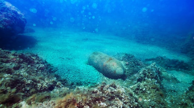 Representative image of a rusty bomb on a seabed.