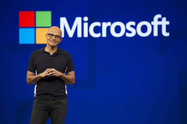 Satya Nadella, chief executive officer of Microsoft Corp., smiles during the Microsoft Developers Build Conference in Seattle, Washington, U.S., on Wednesday, May 10, 2017. Microsoft said it will focus investments on Azure cloud services meant for the Internet of Things, in which multiple sensors and smaller computing devices track data that can be analyzed by the company's cloud and artificial intelligence tools. Photographer: David Ryder/Bloomberg via Getty Images