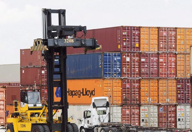Containers are unloaded at the Port of Montreal in Montreal on July 20, 2017. THE CANADIAN PRESS/Ryan Remiorz